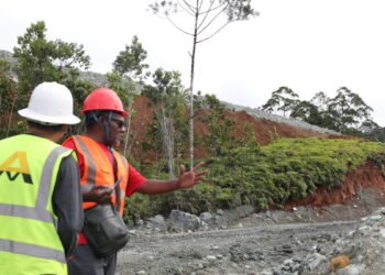 Monitoring tea leader Philip Riogano talking to a company official 1200x675 1