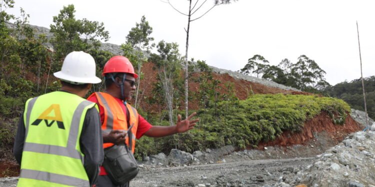 Monitoring tea leader Philip Riogano talking to a company official 1200x675 1